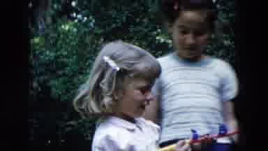 Hicksville New York (1955): A Mother And Children Play Together Outside On A