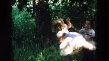 Hicksville New York (1955): Two Child Are Swing Playing In The Ground