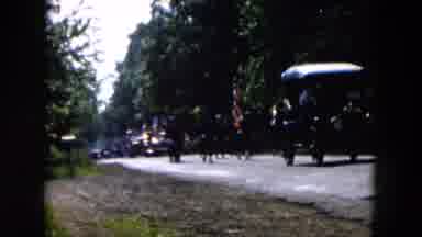 Hicksville New York (1955): Marching Parade Of Soldiers Holding American Flag Down