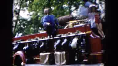 HICKSVILLE NEW YORK-1955: A Parade That Included Three Men Holding American Flags