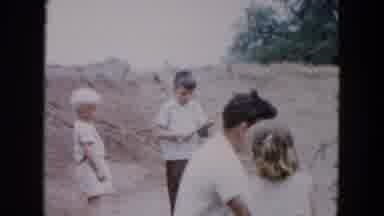 Hicksville New York (1955): A Man Helps A Girl Fish While A Nearby Boy Fishes