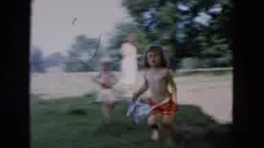 Hicksville New York (1955): There Are More Than One Babies Playing In The Water