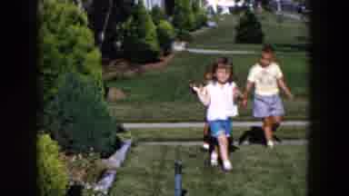 Hicksville New York (1955): Adorable Little Girl Holds Metallic Toy Walks Ahead