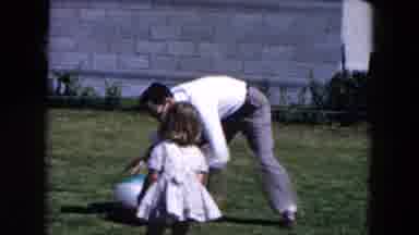Hicksville New York (1955): A Man Is Playing A Ball With His Child With Cute Smile