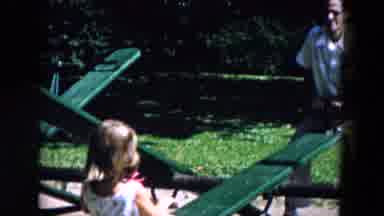 Hicksville New York (1955): A Child Is Playing In Park With Another Person