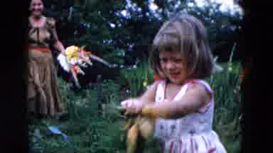 Hicksville New York (1955): Girl Wearing White Dress Holds Pink Orange And Yellow