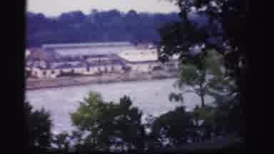 Albany New York (1955): People Walking Along Trail Near A Large River And