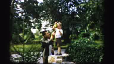 Albany New York (1955): Man And Child Sharing Grapes In A Park And Enjoying Nature