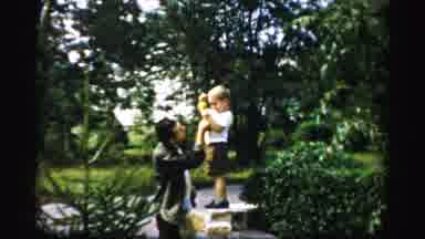 Albany New York (1955): A Father And His Son Eating An Apple Together
