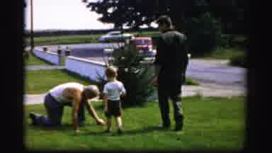 ALBANY NEW YORK-1955: Three Males Of Different Age Groups Are Socializing