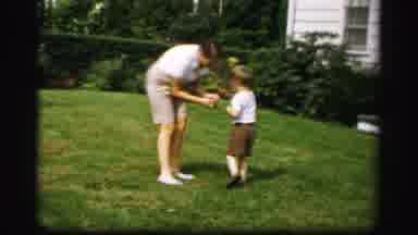 Albany New York (1955): Little Boy Gives Mother Something And Then Runs Across The