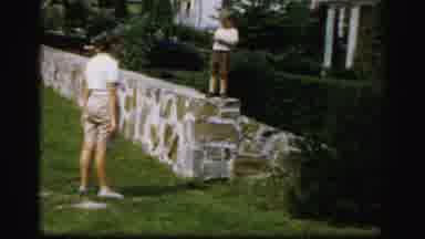 Albany New York (1955): Small Boy On Stone Wall Throwing Ball (?) To Woman