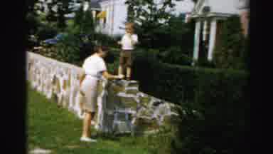 Albany New York (1955): Family Playing Around A Stone Wall In Front Of A House