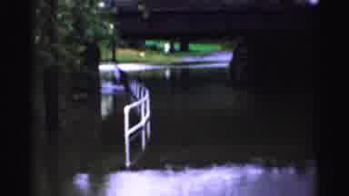 Albany New York (1955): Water Flowing Under A Bridge With Trees On The Side Of The