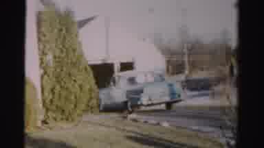 Albany New York (1955): A Car Driver Takes His Car In The Reverse Side