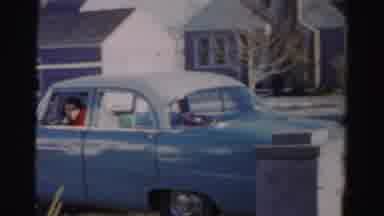 Albany New York (1955): Woman Backing Her Blue Car Up Man Closing Front Door And
