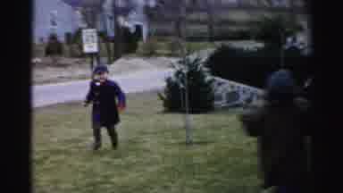 Albany New York (1955): Multiple Children Running Around And Eating Candy While