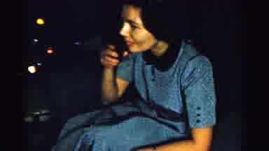 Albany New York (1955): White Woman With Short Brown Hair Sitting In A Blue Dress