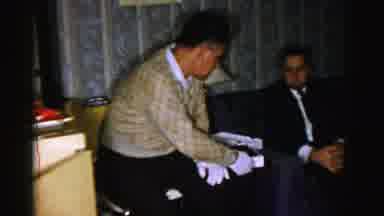 Albany New York (1955): Two Gentlemen Sharing Box Chocolate Candy Offering To
