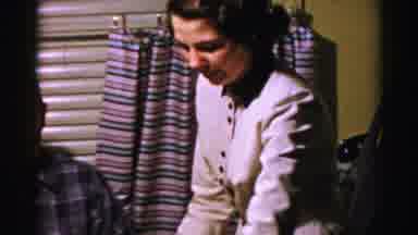 Albany New York (1955): Woman Wearing White Dress Serves Pie To Guests At Home