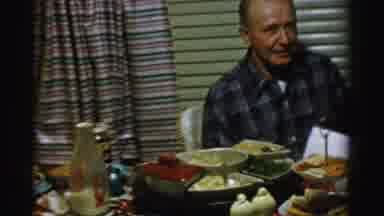 Albany New York (1955): People Talking And Eating Evening Holiday Meal At Food