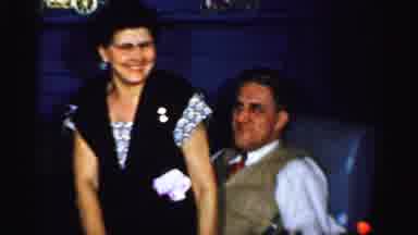 Albany New York (1955): Woman And Man Sit Together On A Blue Chair And The Woman