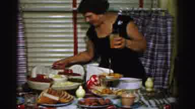 Albany New York (1955): A Gentleman Is Helping To Prepare Dinner While The Lady Is