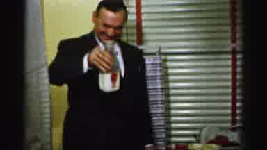 Albany New York (1955): There Is A Man Standing With A Bottle Of Milk In Front Of