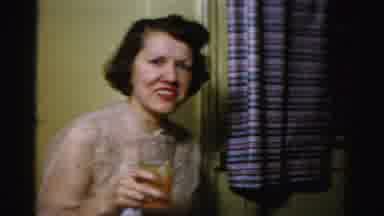 Albany New York (1955): People In Dressy Attire Serve Themselves From A Table Of