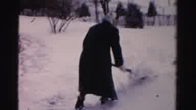 Albany New York (1955): The Person Is Removing Snow With Spade Tool