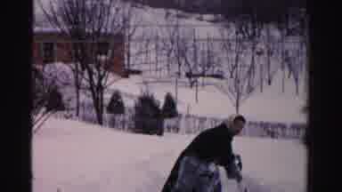 Albany New York (1955): Winter Scene Shows A Woman Shoveling The Snow From In