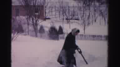 Albany New York (1955): Woman With Shovel Surrounded By Snow Person In Red Coat