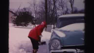 Albany New York (1955): Woman In A Red Coat And Hat Working Hard As She Shovels