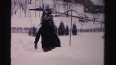 Albany New York (1955): Men Wearing Black Coats Shovel Snow On A Clear Winter Day