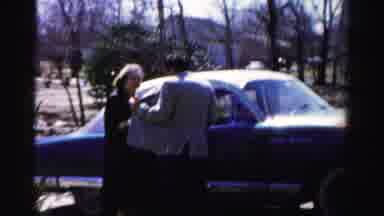 Albany New York (1955): A Family Going For A Walk Down The Street And A Man