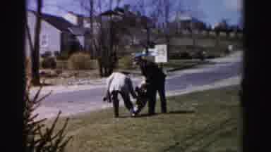 Albany New York (1955): Child Refuses To Stand To Take A Picture With His Father