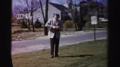 Albany New York (1955): Clip Of People In Yard Of Home Dressed Nicely In Older