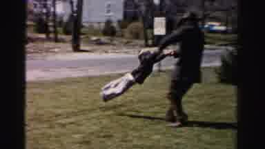 Albany New York (1955): Father And Son Playing On A Front Lawn Together
