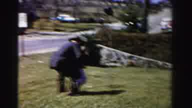 Albany New York (1955): Grandpa Picking Up Grandson To Allow Him To See Over