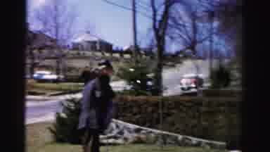 Albany New York (1955): Man Holding Boy While Rocking Hat On Tree Branch Man Holds