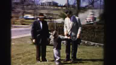 Albany New York (1955): Man Plays Keep Away With Child's Hat And Is Caught By