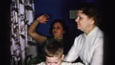 Albany New York (1955): Two Adults And One Child Getting Ready To Take A Family