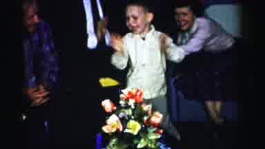 Albany New York (1955): Young Boy Happily Claps In A Room Full Of Adults