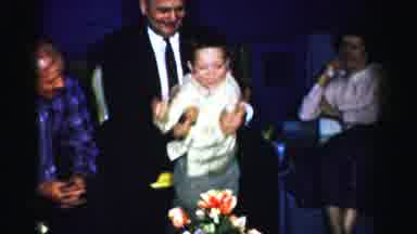 Albany New York (1955): A Happy Kid Jumping Up And Down With His Family At An