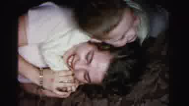 Albany New York (1955): A Child And A Woman Playing At Night On The Ground