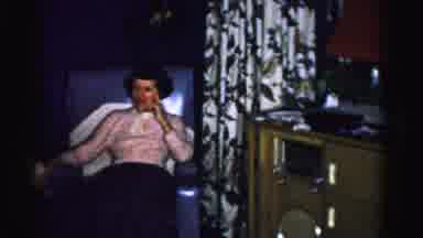 Albany New York (1955): A Man In A Suit And Tie Plays With A Boy While A Woman And