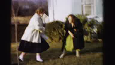 Albany New York (1955): Young Boy And Two Women Wearing Coats Running In Grass