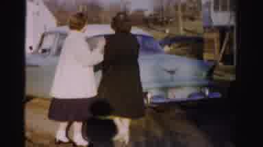 Albany New York (1955): Two Women Wearing A Dress With The Woman In The Green