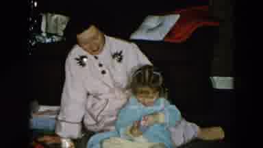 Hicksville New York-1956: Mother Sits On Floor With Baby Daughter In Pajamas And