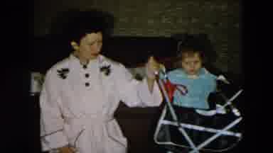 Hicksville New York (1956): The Mom Teaching Her Kid How To Ride A Stroller